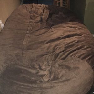 Brown bean bag. NEW